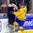 BUFFALO, NEW YORK - JANUARY 2: Sweden's Glenn Gustafsson #12 bodychecks Slovakia's Martin Fehervary #6 during the quarterfinal round of the 2018 IIHF World Junior Championship. (Photo by Andrea Cardin/HHOF-IIHF Images)

